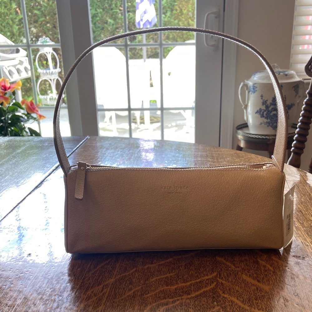 kate spade tan leather shoulder bag 10 3/4 width
4 1/2 inches wide